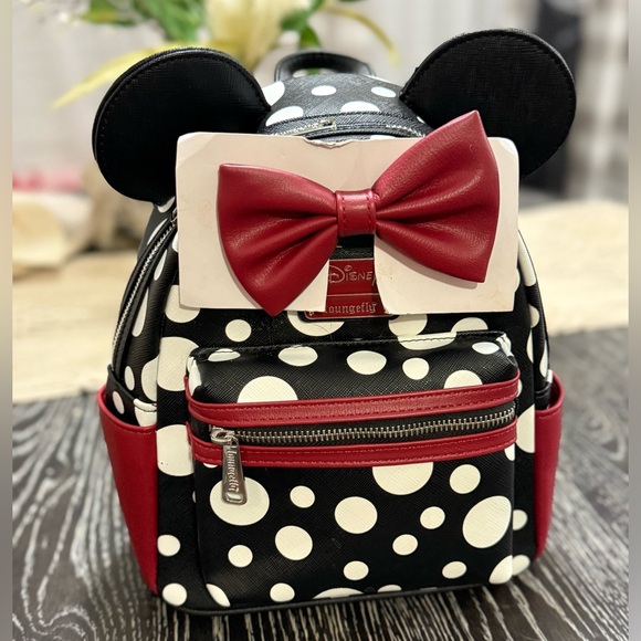 Loungefly Handbags - Minnie Mouse Polka Dot Disney LoungeFly NWT never worn